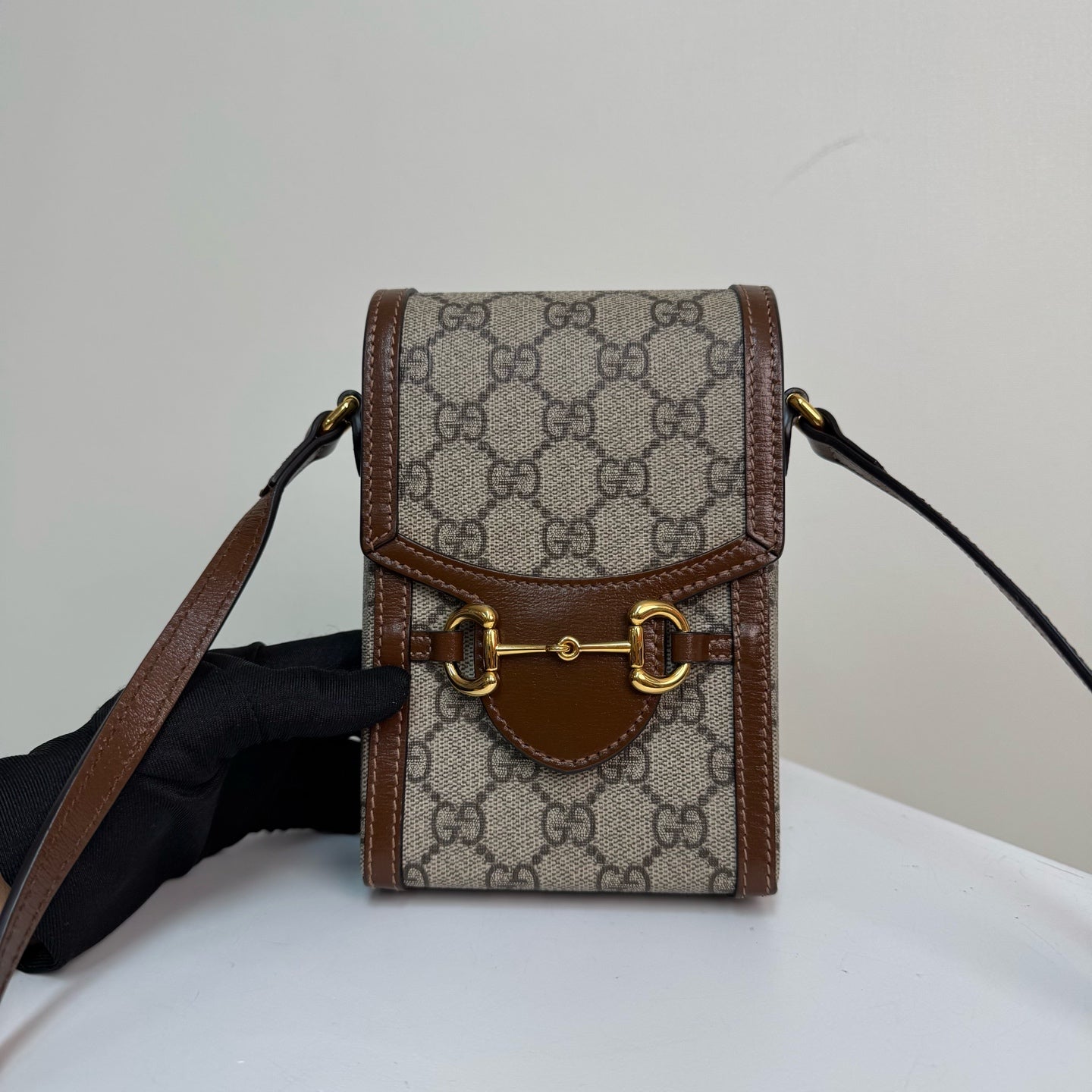 Gucci Horsebit 1955 phone holder in beige and ebony GG Supreme canvas 625615 92TCG 8563