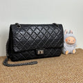Chanel Large 2.55 handbag, Aged calfskin & gold-tone metal, black A37587Y04634C3906